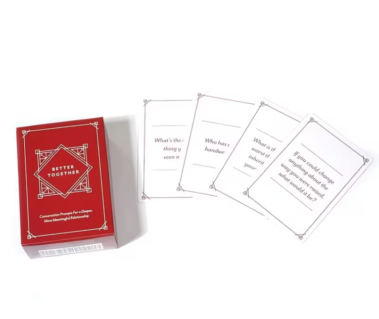 A red box labeled 'Better Together' sits beside four white cards with printed prompts, photographed on a clean white background.